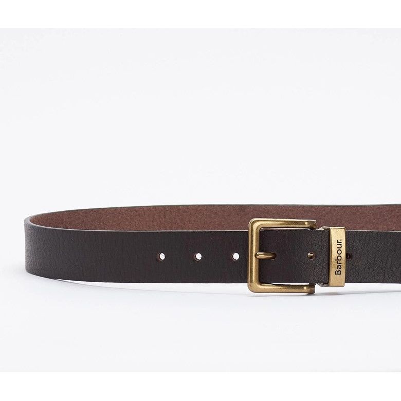 Brown leather belt with brass buckle and Barbour branding on white background