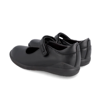 Pair of black leather Mary Jane school shoes with Velcro straps on white background