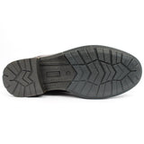 Black rubber shoe sole with deep tread pattern for grip and durability, viewed from below