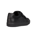 Black leather boys' trainer with velcro strap and textured sole, rear side view