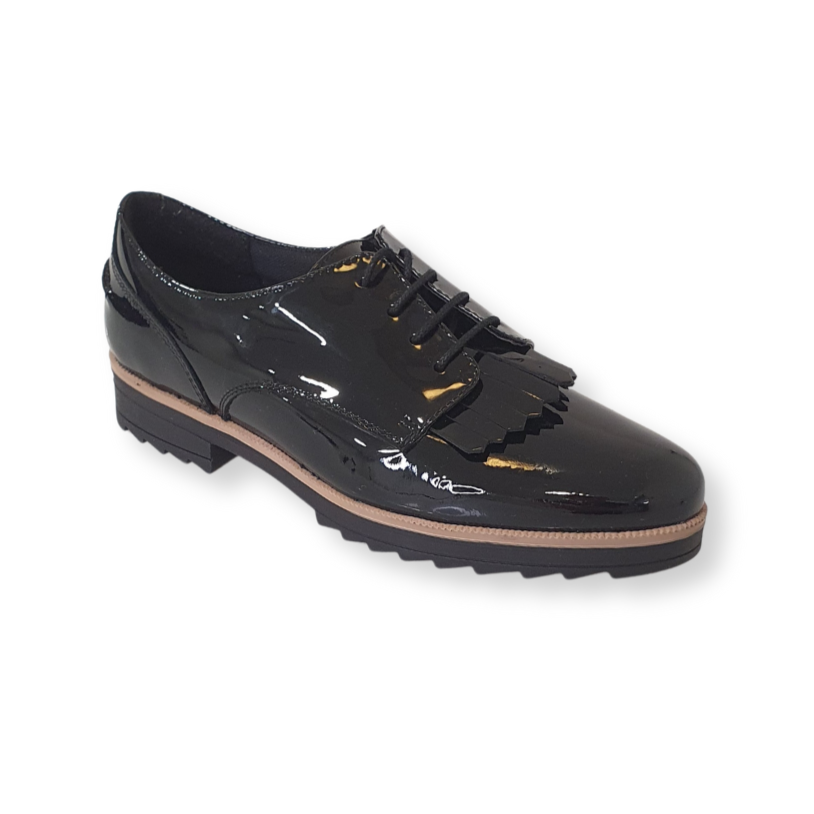 Black patent leather lace-up brogue shoe with fringed detail and chunky sole