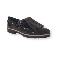 Black patent leather loafer with fringe detail, buckle strap and chunky sole