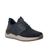 Navy and brown sneaker on a white background