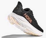 Hoka women's black and gold trainer