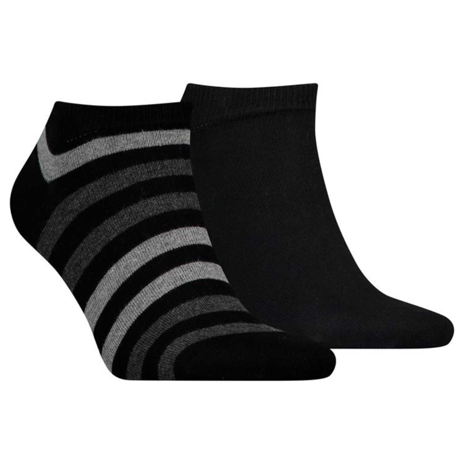 Pair of low-cut ankle socks, one solid black, one with black and grey stripes