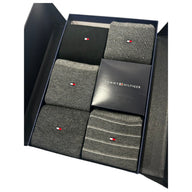 Gift box of assorted grey and black men's socks with small red and white logo details